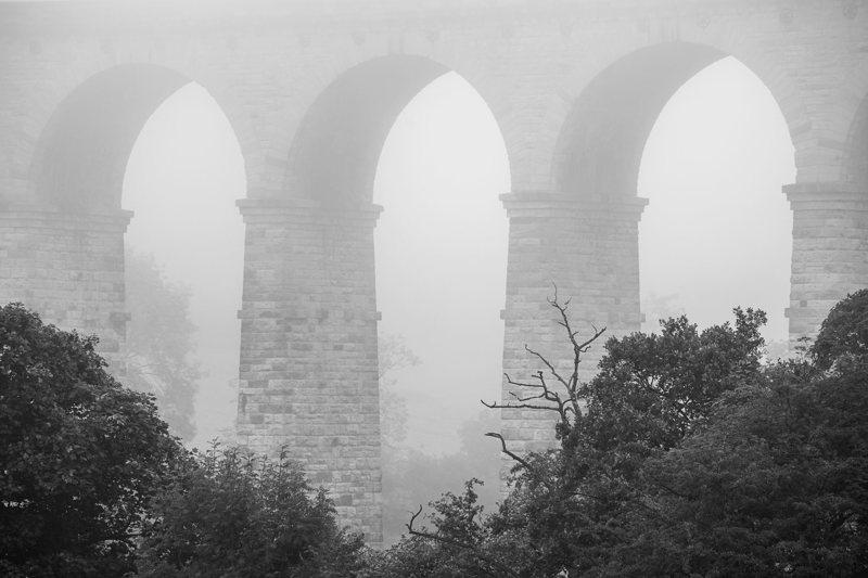 Viaduct in summer mist