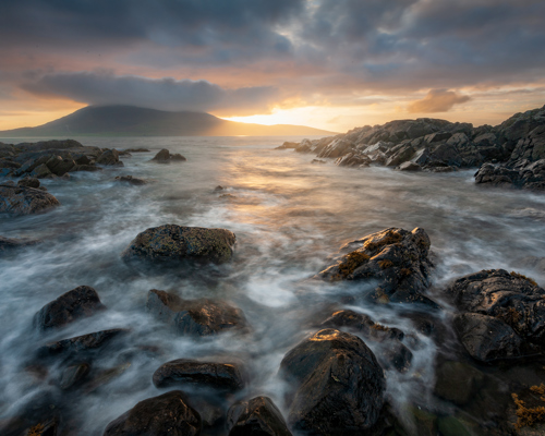 Seascapes of the Outer Hebrides:  a rocky beach with a sunset