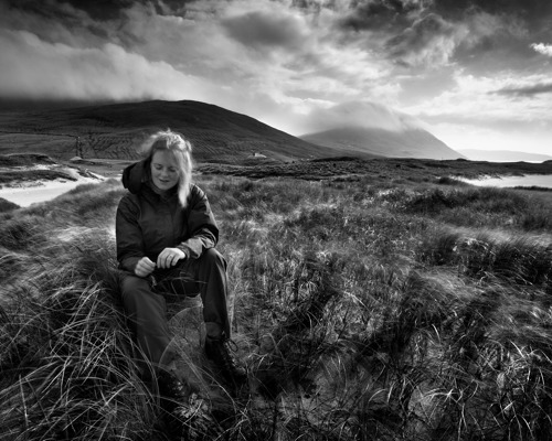 Seascapes of the Outer Hebrides: My amazing wife a person sitting in a grassy field