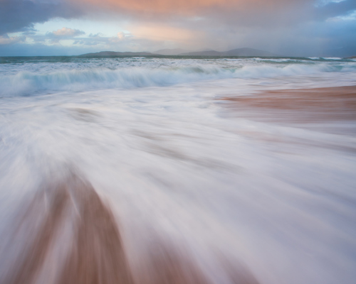 Seascapes of the Outer Hebrides:  a wave crashing on a beach