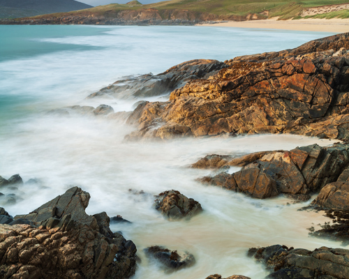 Seascapes of the Outer Hebrides:  a rocky beach with waves crashing against it
