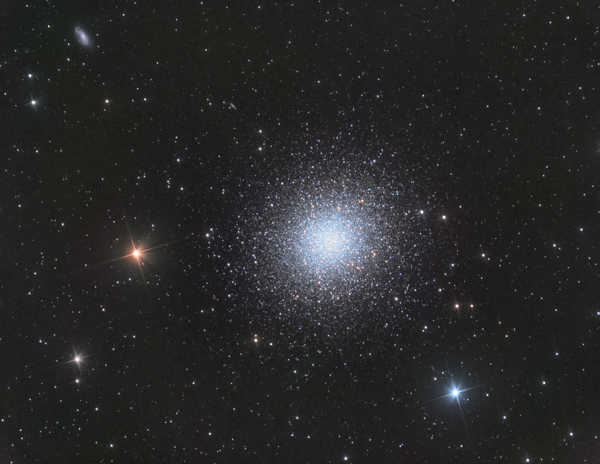 a star in the middle of the night with Gallery Arcturus in the background