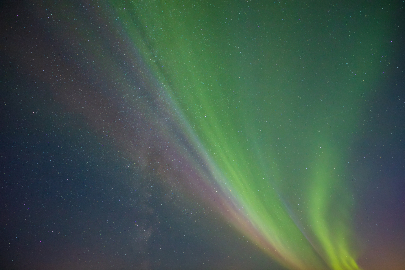 Northern Lights taken with Canon 11-24mm L lens a green and purple aurora borealis